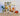Sticker book titled 'Shell Yeah' with shell-shaped stickers on a sandy background