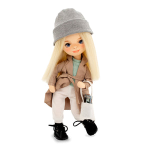 Sweet Sisters- Mia in a beige trench coat