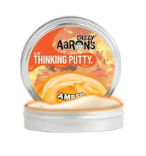 Load image into Gallery viewer, AMBER GLOW IN THE DARK PUTTY  10CM TIN
